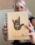 Wooden note book made by a Deaf man